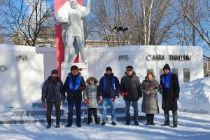 Воскресенцы возложили цветы к мемориалам в День защитника Отечества